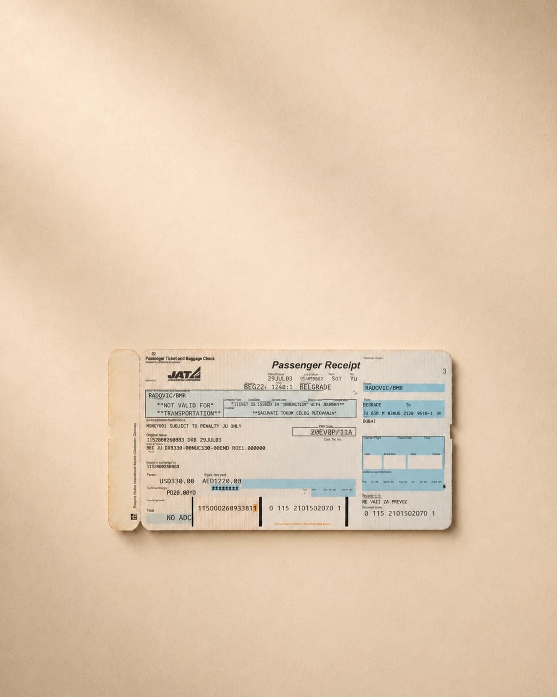 Book-style image of the original 2003 airline ticket that marked the beginning of a new life chapter.